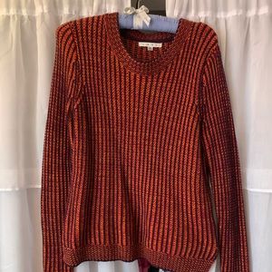 Multi color sweater.